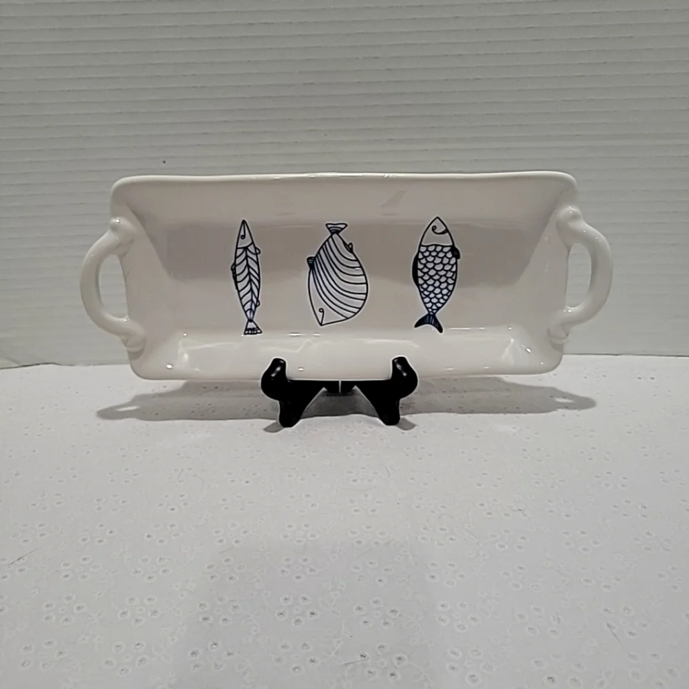 Pier 1 blue and white stonewear with various fish designs Hors d Deuvres